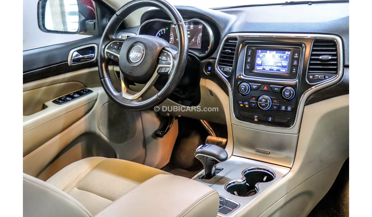 جيب جراند شيروكي Jeep Grand Cherokee Laredo 2014 GCC under Warranty with Zero Down-Payment.