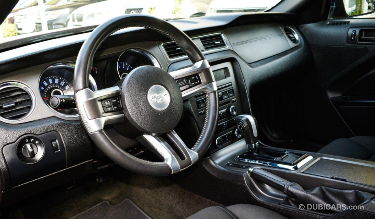 Ford Mustang Coupe, red color inside black, in excellent condition, you do not need any expenses