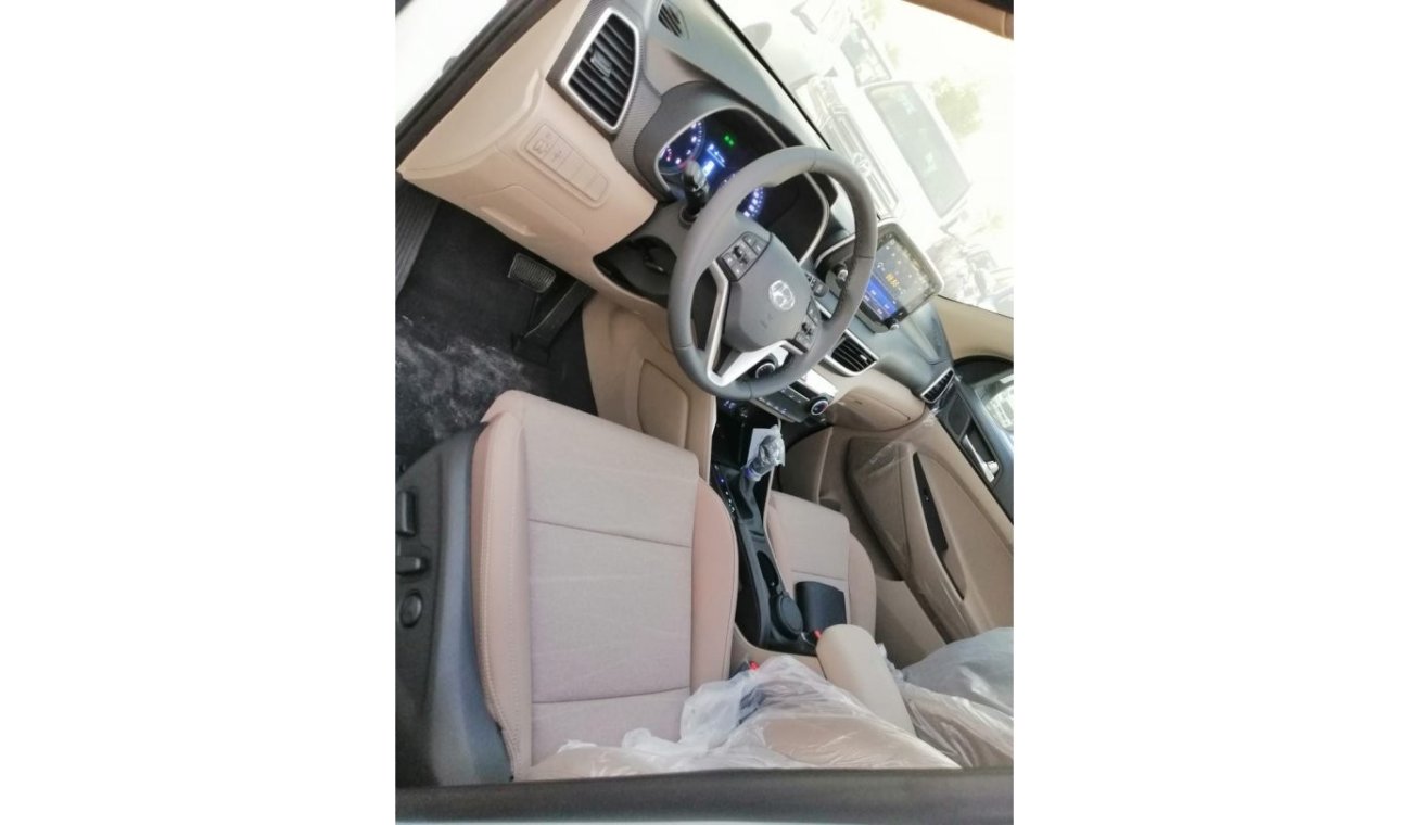 Hyundai Tucson 2.0 WITH BUSH START AND 2 ELECTRIC SEAT 2.0 مع بصمه واثنين كرسي كهرباء