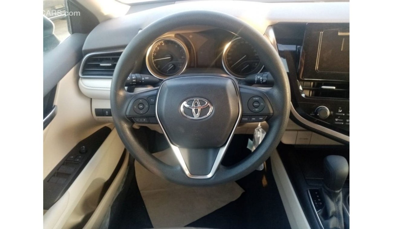 Toyota Camry LE 2022  White inside beige 2.5L petrol 4 Cylinder