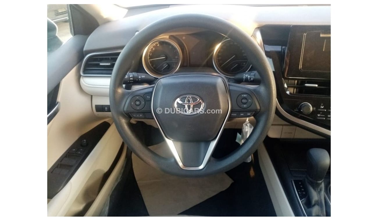 Toyota Camry LE 2022  White inside beige 2.5L petrol 4 Cylinder