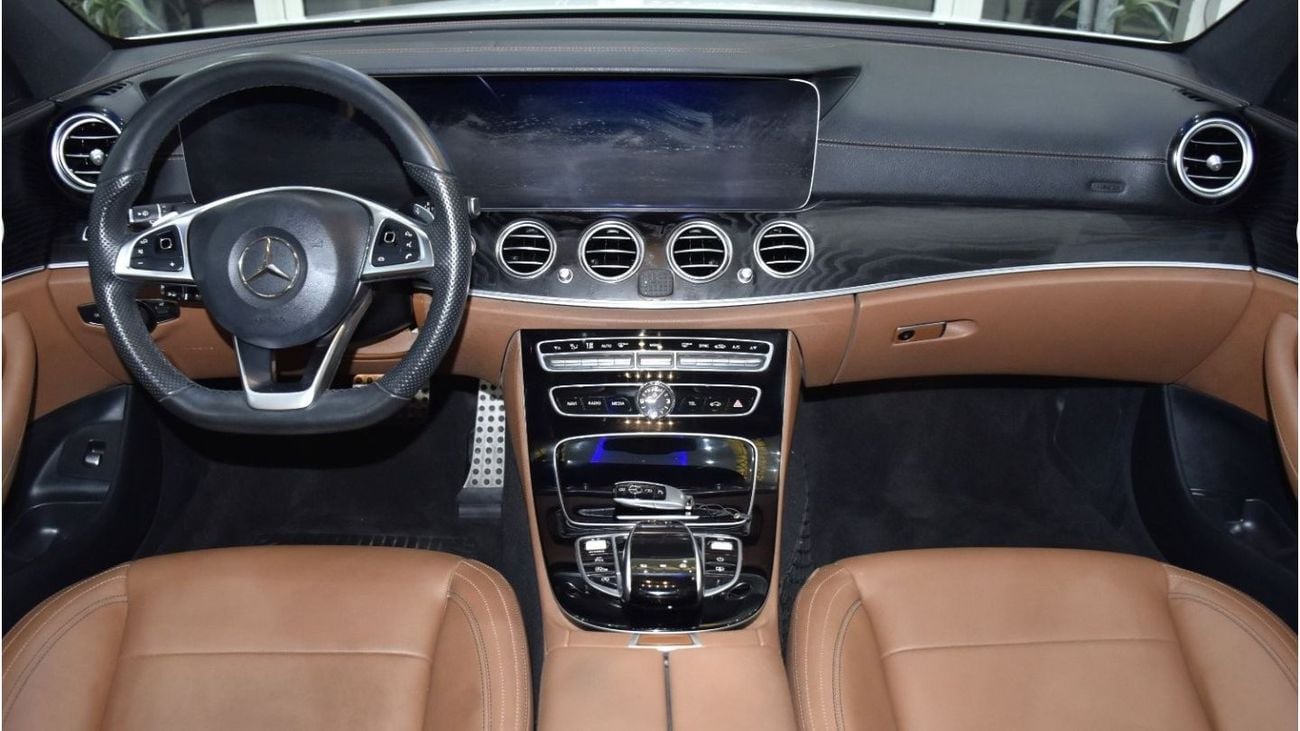 Mercedes-Benz E300 EXCELLENT DEAL for our Mercedes Benz E300 ( 2018 Model ) in White Color GCC Specs