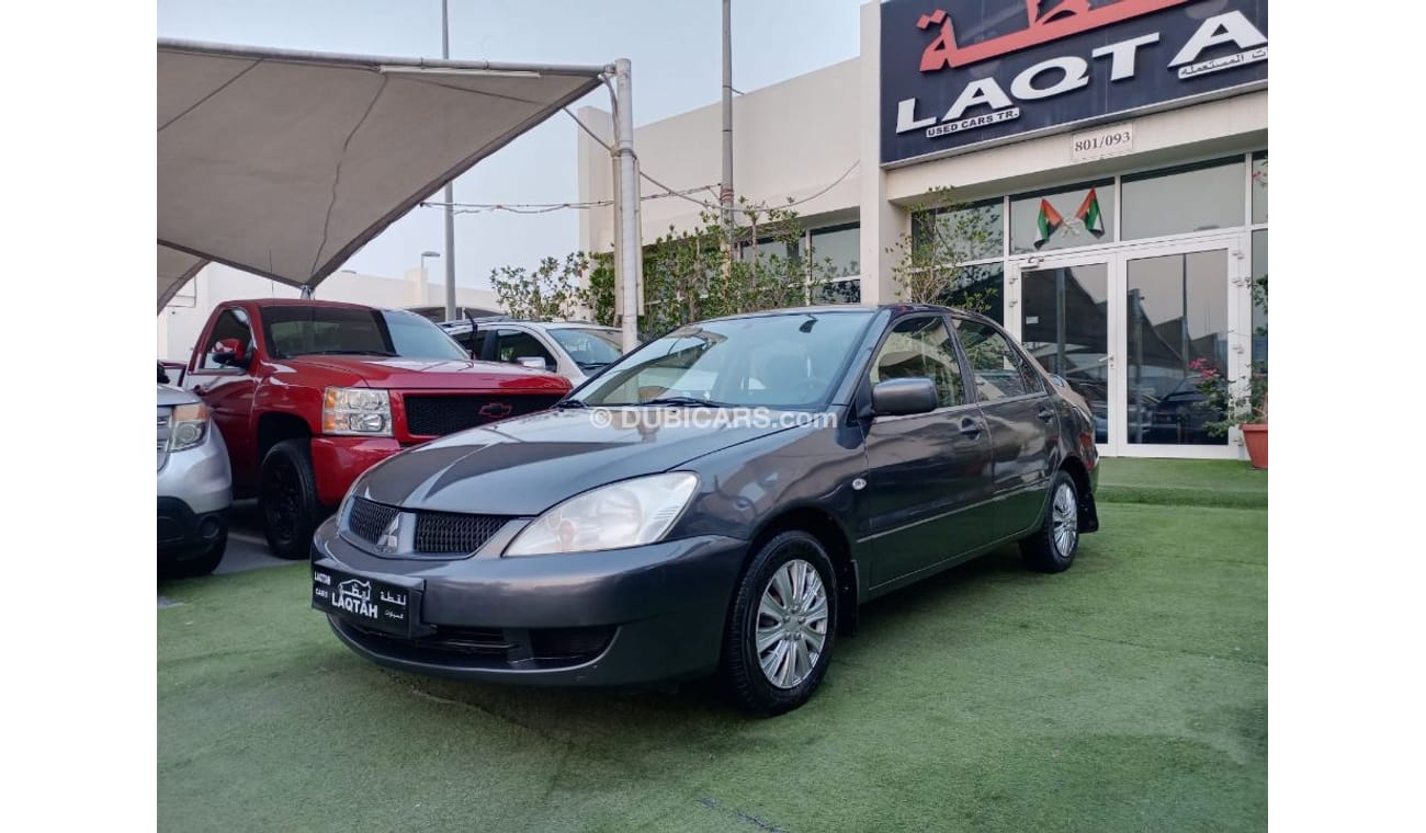 ميتسوبيشي لانسر خليجي 2009 تكييف باورأوتوماتيك سنتر لوك جناح خلفى بحالة ممتازة جدا لاتحتاج الي أى مصاريف