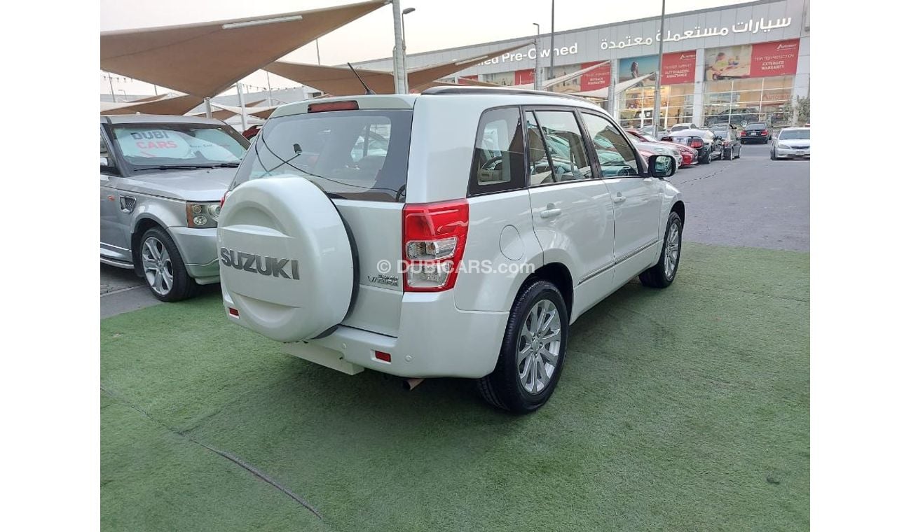 Suzuki Grand Vitara Gulf model 2016 No. 1 cruise control, wheels, sensors, screen, in excellent condition, you do not ne