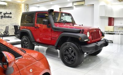 Jeep Wrangler EXCELLENT DEAL for our Jeep Wrangler Sport ( 2014 Model ) in Red Color GCC Specs