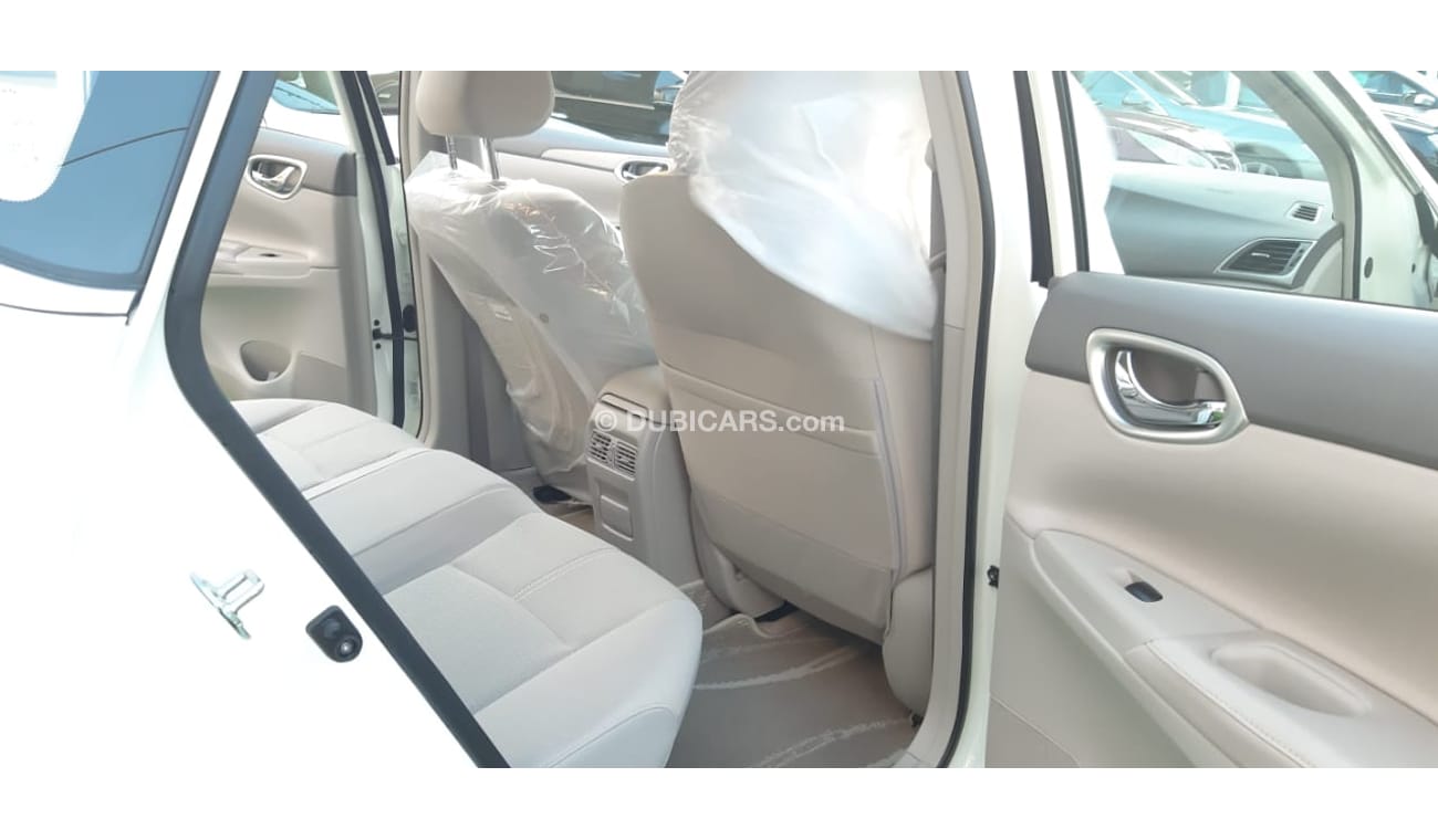 Nissan Sentra Gulf - agency condition - white paint inside beige in excellent condition, you do not need any expen