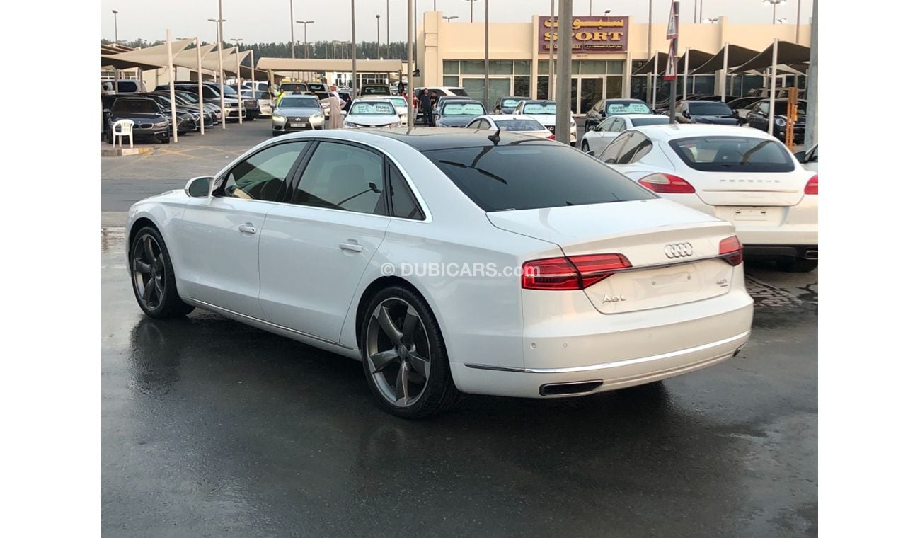 أودي A8 موديل 2015 خليجي فل مواصفات بانوراما ومثبت سرعه وتحكم كهربي كامل و5كاميرات وستاير وشاشات وطاولات خلف