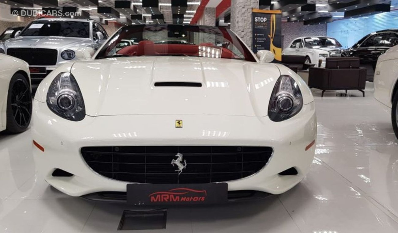 فيراري كاليفورنيا 2011 Ferrari California Gcc car finished in white , full red leather , Immaculate