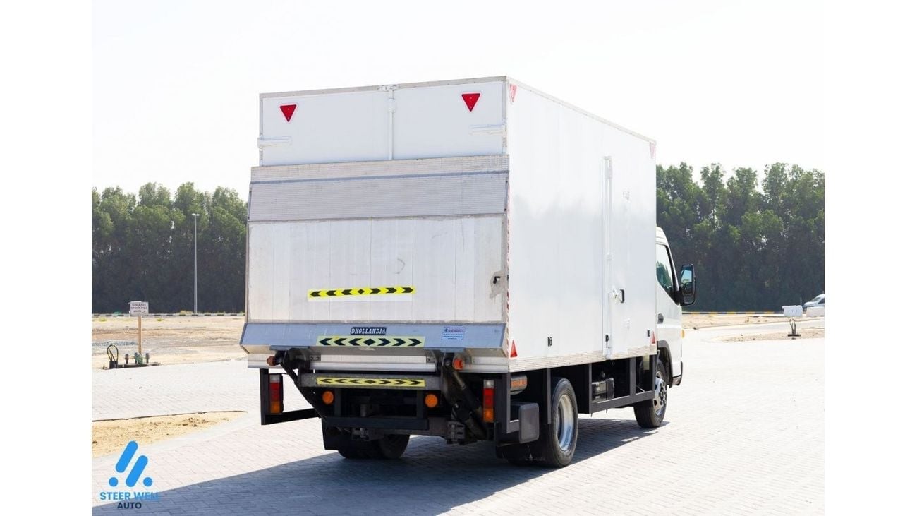 ميتسوبيشي فوسو كانتير 2022 Closed Box with Tail Lift - Short Chassis - Diesel MT - Low Mileage - GCC