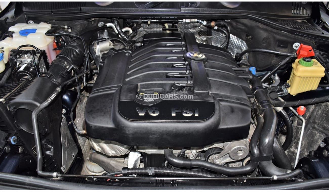 Volkswagen Touareg SEL EXCELLENT DEAL for our Volkswagen Touareg ( 2015 Model! ) in Blue Color! GCC Specs