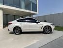 بي أم دبليو X6 AED 1,880 P.M | 0% DOWN PAYMENT | BMW X6 XDRIVE35I M KIT | AGENCY SERVICE HISTORY | 2019 | GCC SPECS