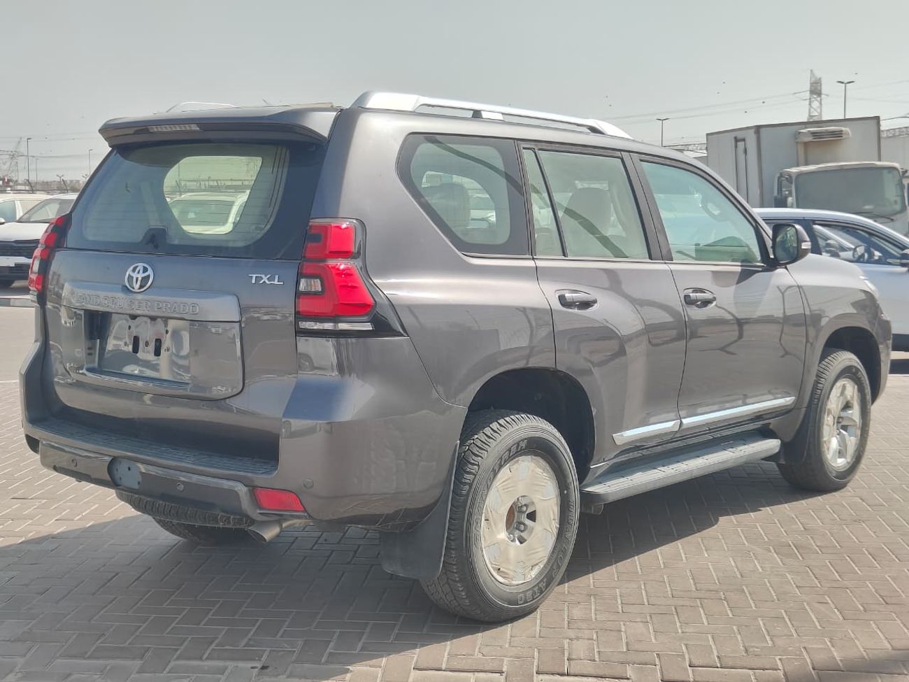 تويوتا برادو 2023 Toyota Prado TXL Spare-Down 7-Seater 4.0L V6 Petrol A/T 4WD Export Only