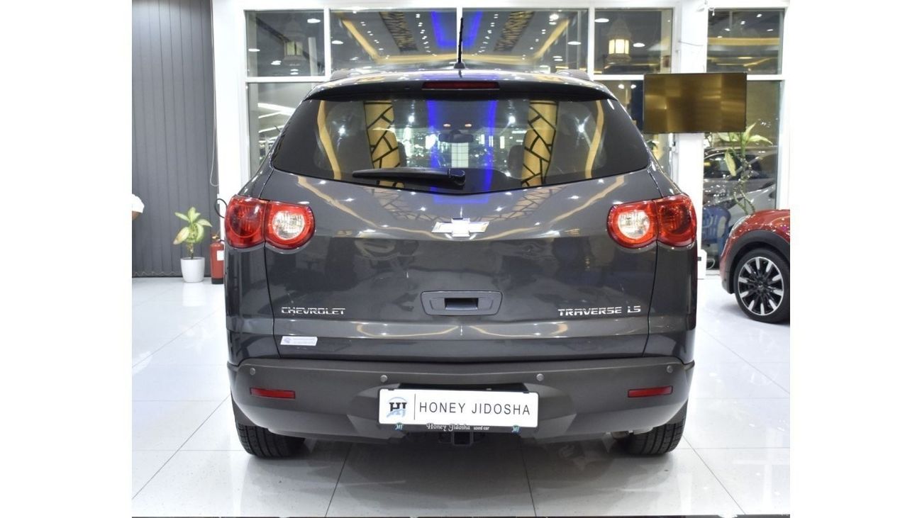 Chevrolet Traverse EXCELLENT DEAL for our Chevrolet Traverse LS ( 2012 Model ) in Grey Color GCC Specs