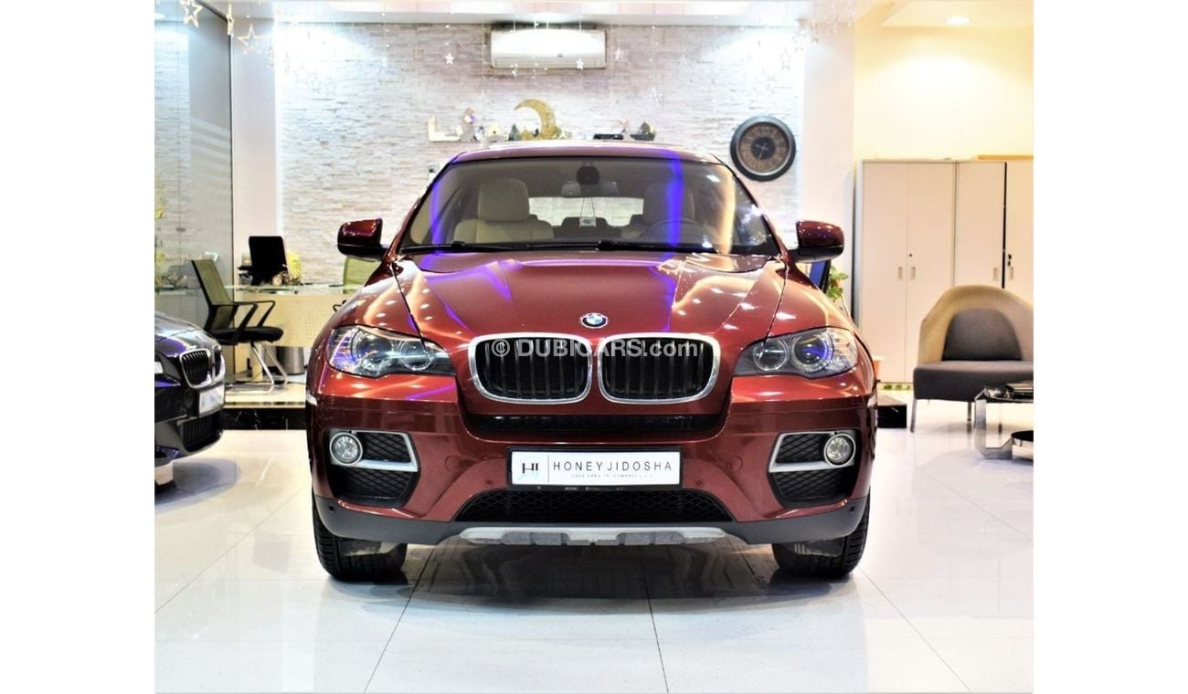 مستعملة بي أم دبليو X6 ( ONLY 53000KM ) AMAZING BMW X6 2014 Model!! in Maroon Color! GCC Specs