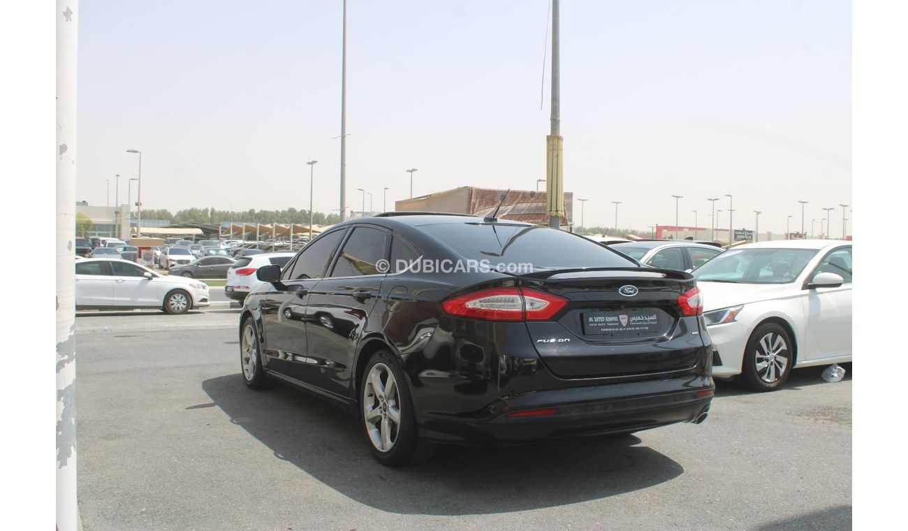 Ford Fusion SEL ACCIDENTS FREE- ORIGINAL PAINT - GCC - SUNROOF - CAR IS IN PERFECT CONDITION INSIDE OUT - GCC