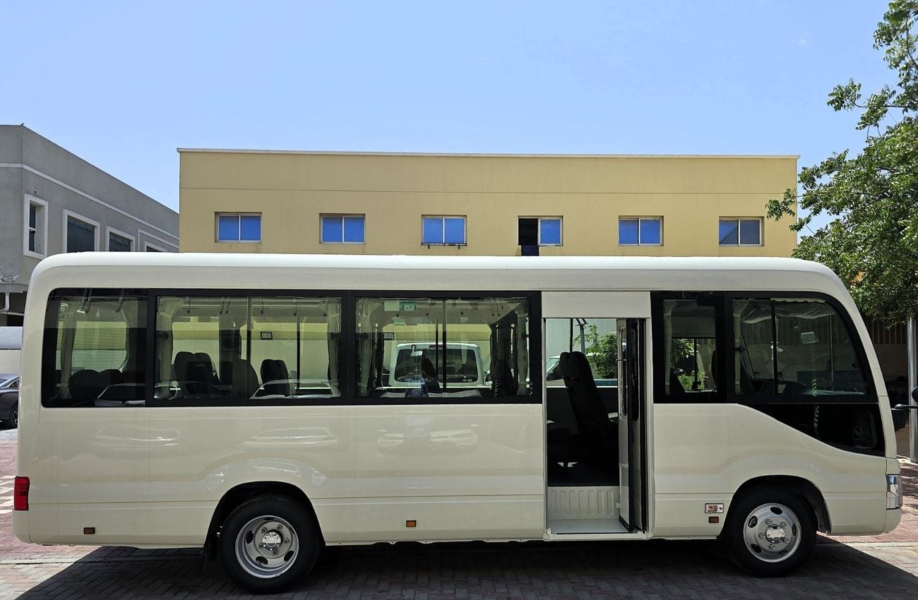 Toyota Coaster Toyota Coaster 2.7l M/T RWD 23 seats Automatic Door white color Gcc Specs 2026 Model 026