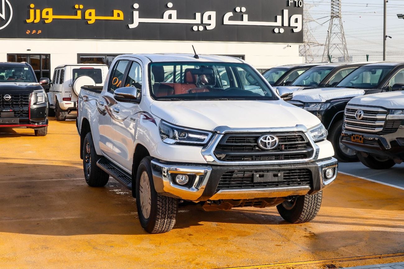 تويوتا هيلوكس Toyota Hilux (TGN126) 2.7L Pick-Up 4WD Double Cab – 2026 Model (A/T, White exterior, Red interior, w