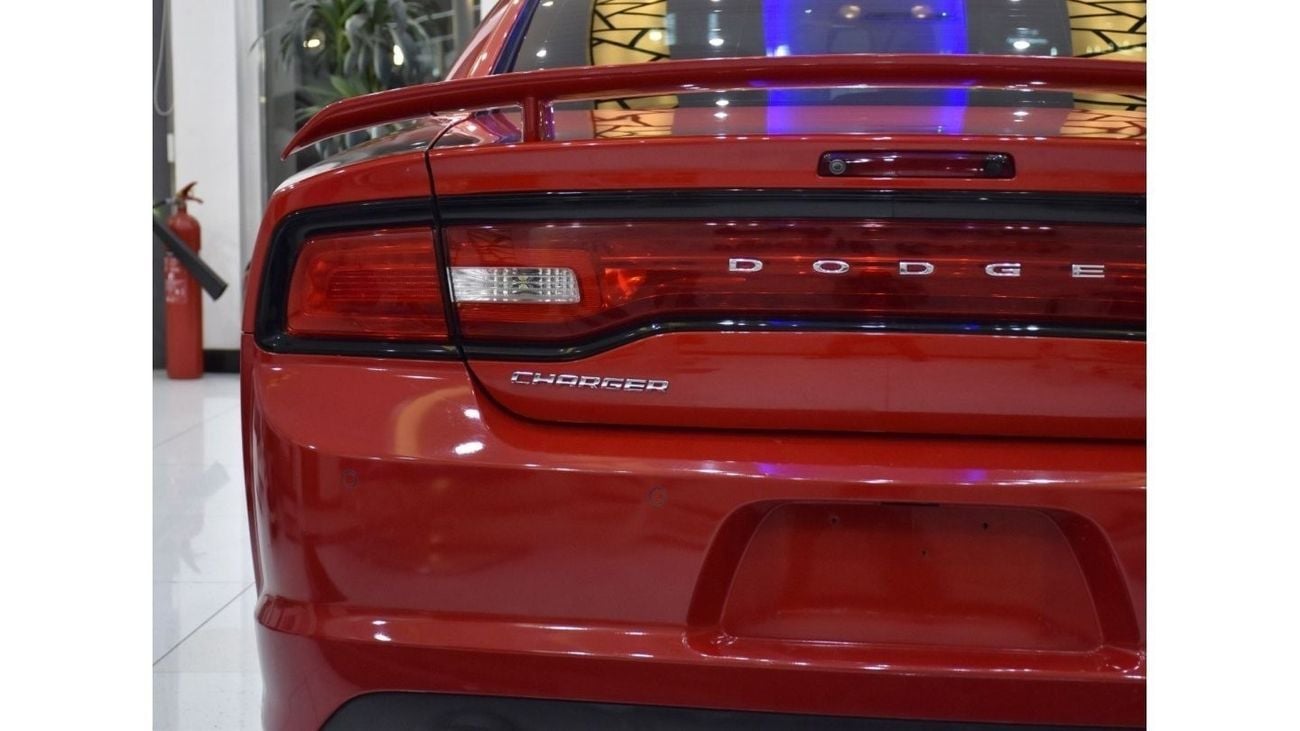 Dodge Charger EXCELLENT DEAL for our Dodge Charger SRT8 6.4 HEMI ( 2014 Model ) in Red Color GCC Specs