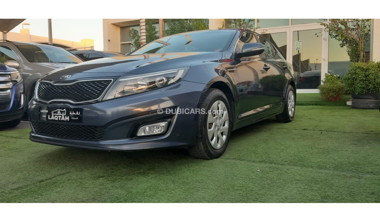 كيا أوبتيما خليجى رقم 2  شاشة   كاميرا  مثبت  سرعة  جناح خلفى رنجات حساسات أنوار ضباب بحالة ممتازة