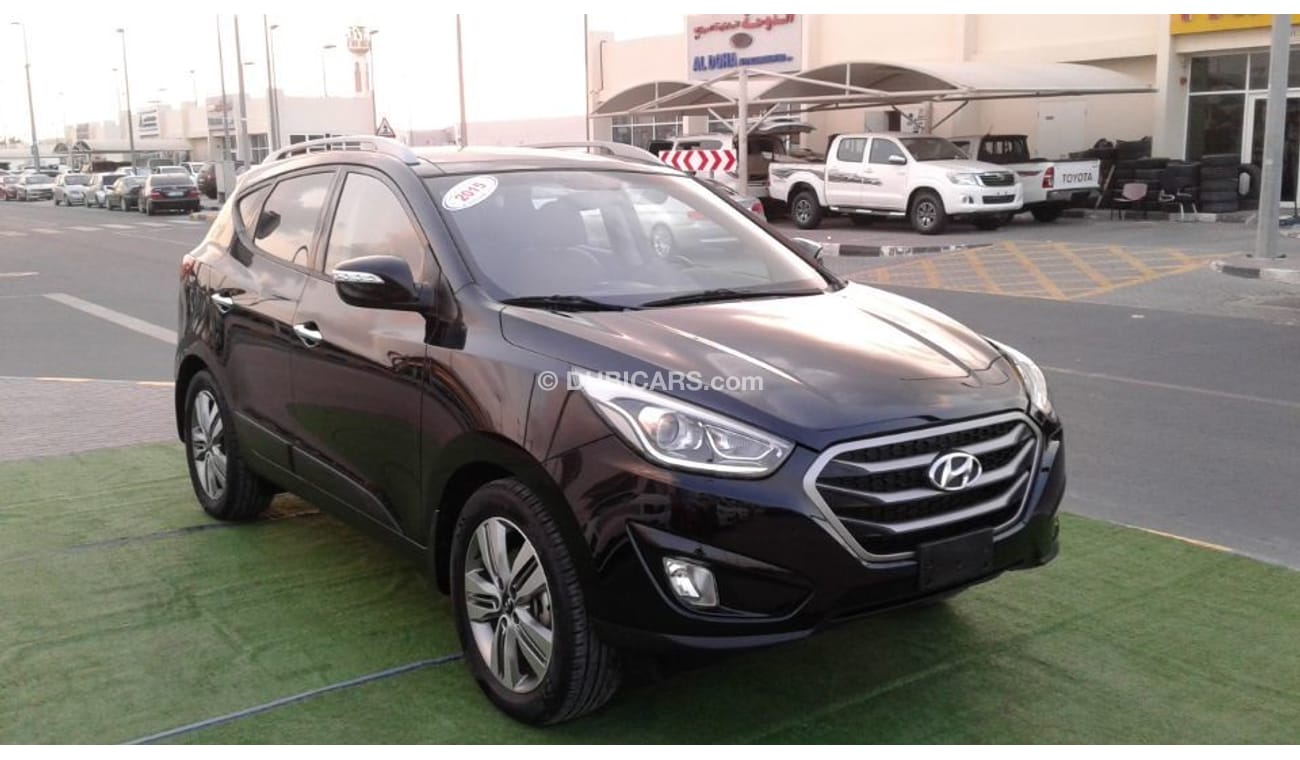 Hyundai Tucson HYUNDAI TUCSON 2015 BLACK NO PIANT NO ACCIDENT KHALIGE FULL OPTION NUMBER 1