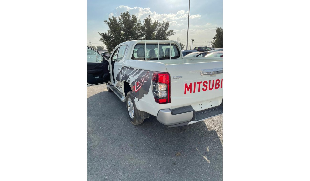 Mitsubishi L200 D/C 2.4 L ENGINE DSL 2020 MODEL 4X4 DOUBLE CABIN DIESEL MANUAL TRANSMISSION BACK ROOF AC