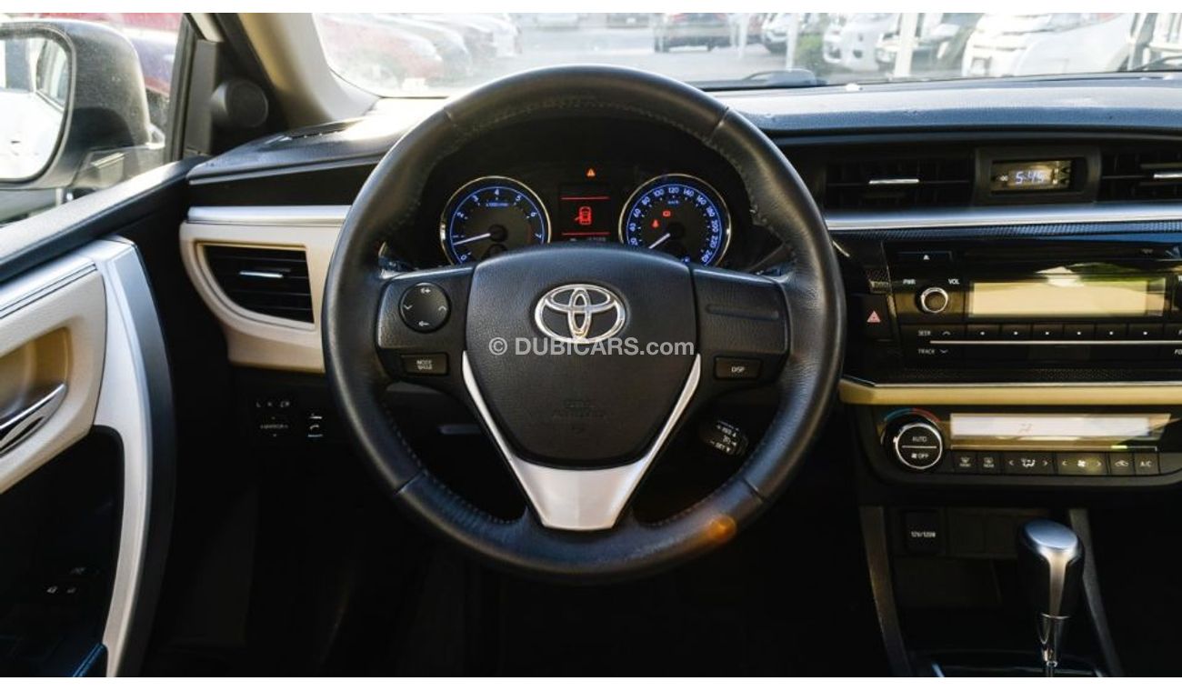 تويوتا كورولا خليجى 2015 رقم واحد فتحة بصمة كاميرا خلفية شاشة تحكم مثبت رنجات حساسات بحالة ممتازة لاتحتاج لمصاريف