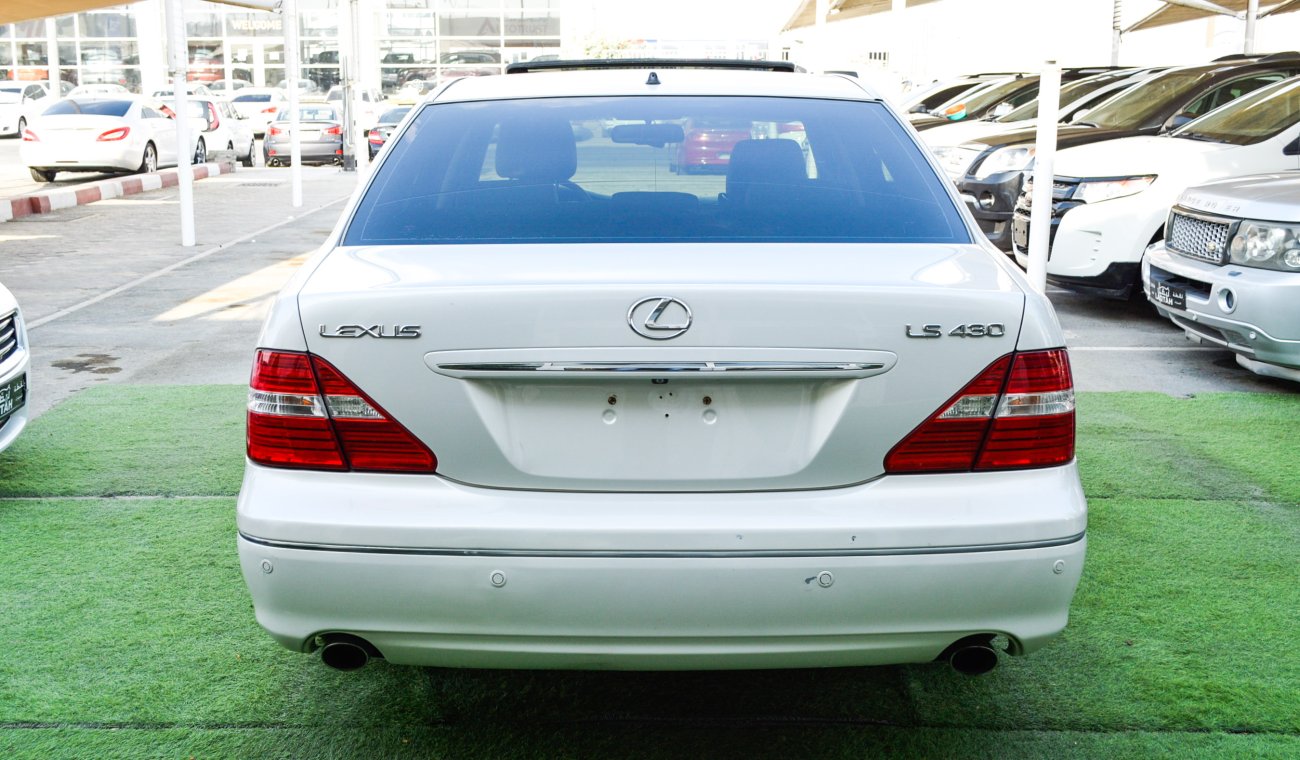 Lexus LS 430 Imported 1/2 Ultra 2006 model, white color, leather opening, wooden wheels, electric mirrors, electr