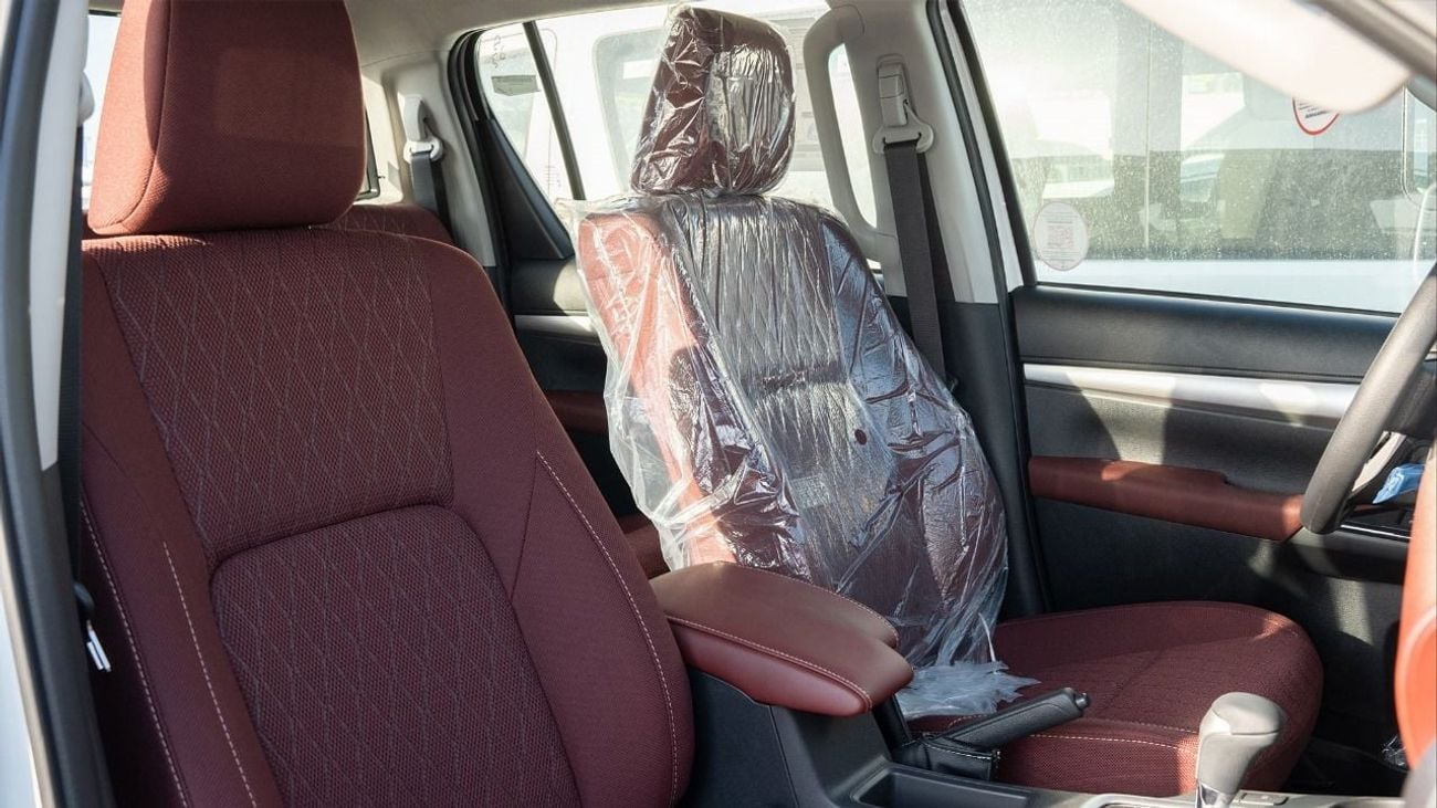 تويوتا هيلوكس 2025 Toyota Hilux 4x4 2.7L petrol AT with cooling seats Full option GCC Specs (Export Price)