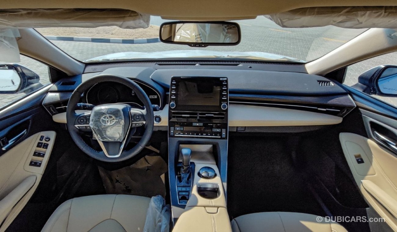 Toyota Avalon XLE Особенности интерьера   ABS+EBD+BA+VSC+TRC+HSA(HiII Start Assist)   Розетка для аксессуаров   По