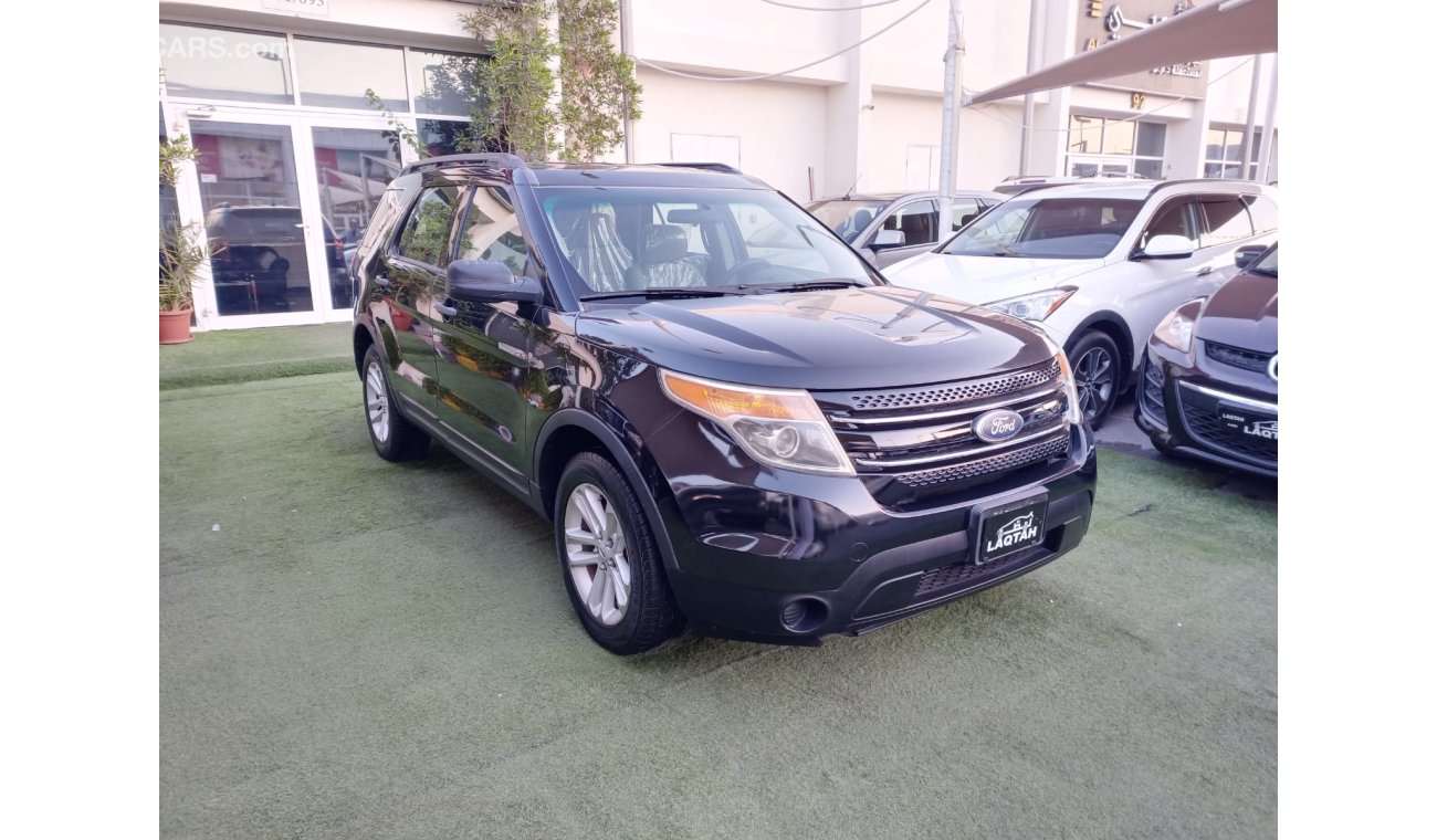 Ford Explorer 2014 model, painted, Gulf agency, cruise control, sensors, wheels, fog lights, wood, rear wing, in e