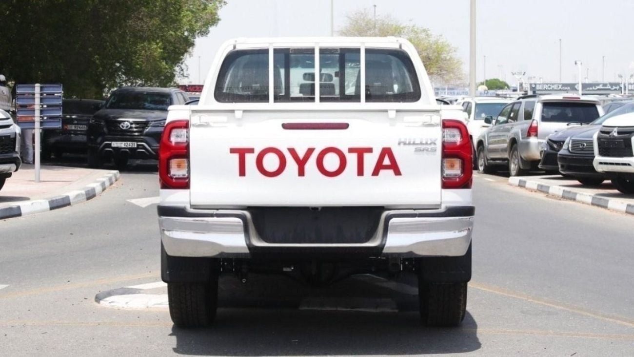 Toyota Hilux 2.4L diesel  . White 2025 model, M/T Wide body with Chrome bumper
