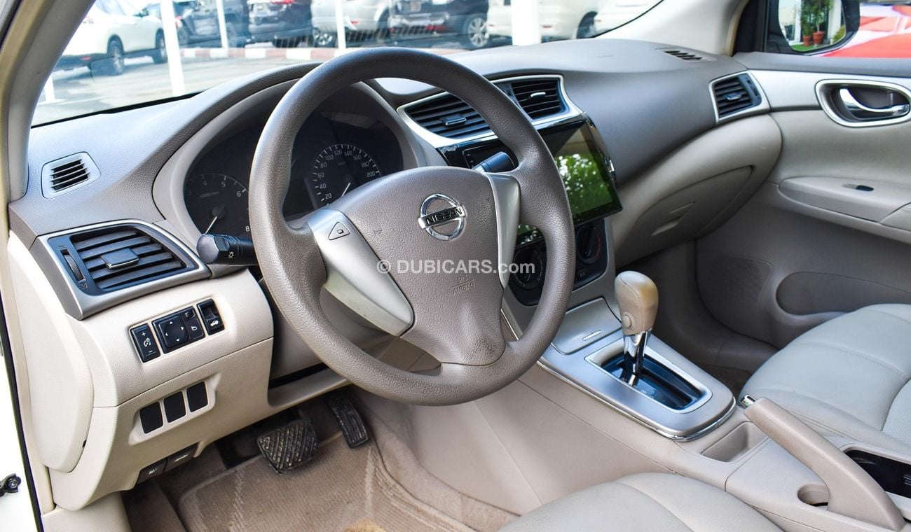 Nissan Sentra GCC, 2016 model, without accidents, white color, beige leather interior, Android screen, rear camera