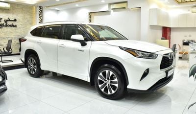 Toyota Highlander GLE HEV EXCELLENT DEAL for our Toyota Highlander Hybrid ( 2023 Model ) in White Color GCC Specs