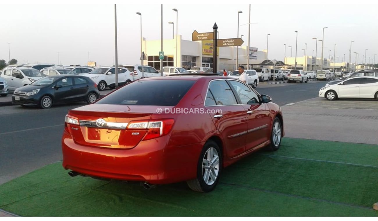 تويوتا كامري تويوتا كامرى عنابى خليجى 2013 فتحة سقف فول ابشن بحالة جيدة