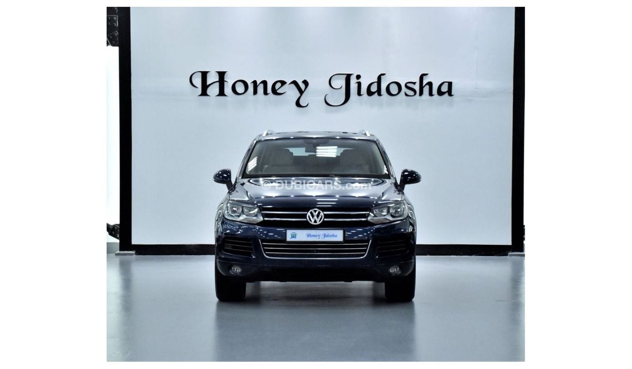 Volkswagen Touareg EXCELLENT DEAL for our Volkswagen Touareg ( 2011 Model! ) in Blue Color! GCC Specs