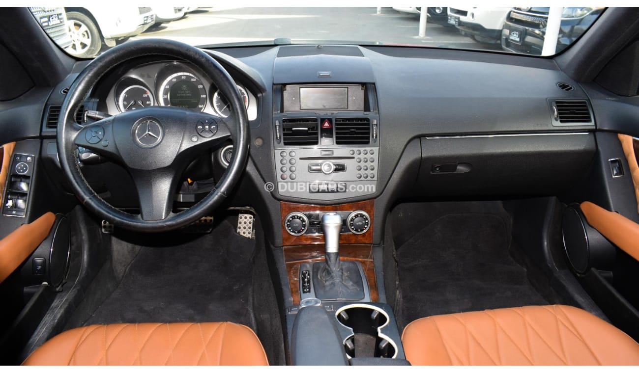 Mercedes-Benz C 300 2009 model, red color, number one, panorama, leather, cruise control, sensor wheels, in excellent co