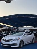 هيونداي أزيرا The 2016 Hyundai Azera Limited Edition is a full-size sedan that offers a blend of luxury and comfor