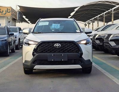 تويوتا كورولا كروس HYBRID FULL OPTION / 2.0L V4 / LEATHER + ELECTRIC SEAT / MUD GUARD /SUNROF / CODE # HYBRID