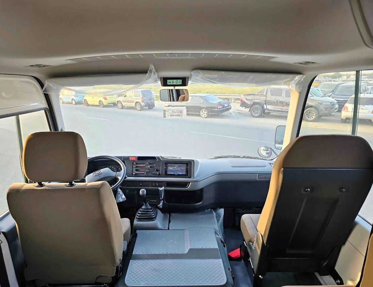 تويوتا كوستر 4.0L V4 DIESEL / 23 STR M/T / AUTO DOOR / BAGGAGE TRAY WITH RACK (CODE # COD4J)