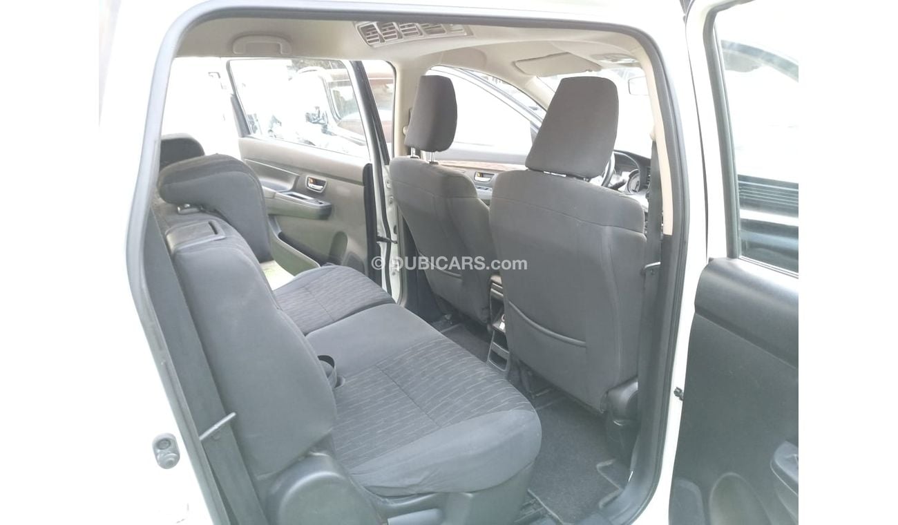 Suzuki Ertiga 2019 model, agency dye, 1600 cc, imprint, white color, rear wing, alloy wheels, air conditioning, wo