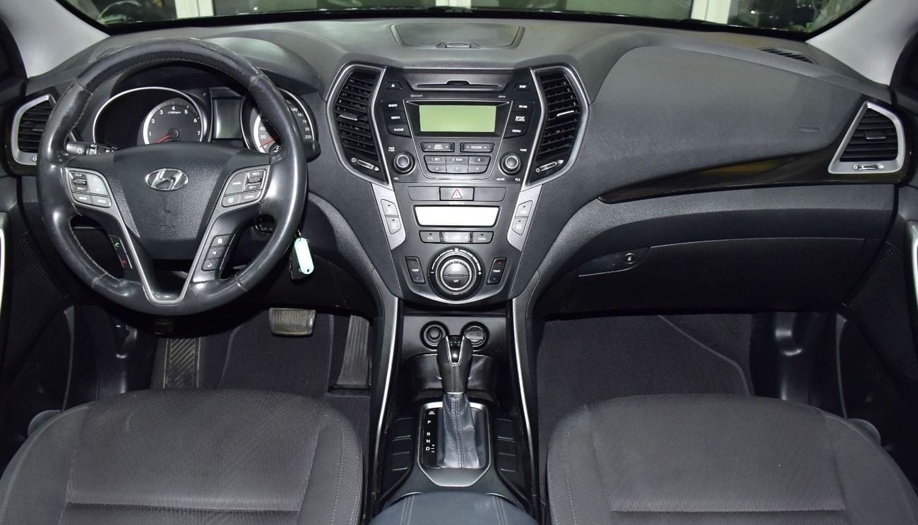 Hyundai Santa Fe EXCELLENT DEAL for our Hyundai SantaFe 4WD 3.3L ( 2014 Model ) in Black Color GCC Specs