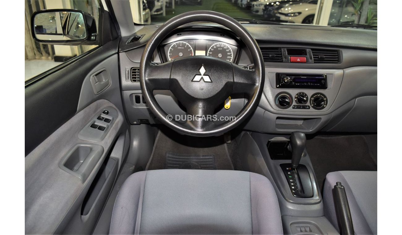 Mitsubishi Lancer EXCELLENT DEAL for our Mitsubishi Lancer 2012 Model!! in White Color! GCC Specs