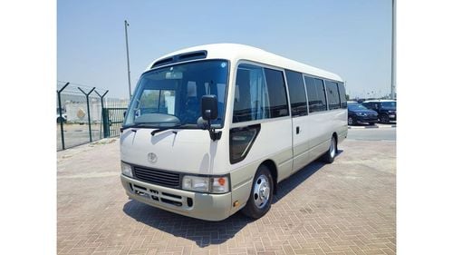 Toyota Coaster HZB56-0001297 || TOYOTA	COASTER (BUS)	1997	WHITE  	4200	DIESEL	47735	RHD	MANUAL ||