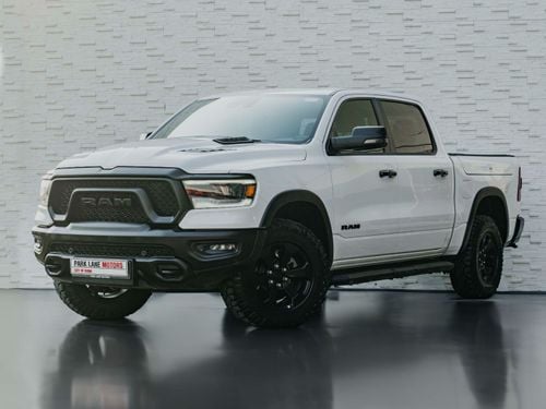 RAM 1500 AED 3,302 PM • RAM 1500 REBEL LUXURY • ONLY 28,000 KMS • 5.7L HEMI® V8 • OFFICIAL DODGE WARRANTY
