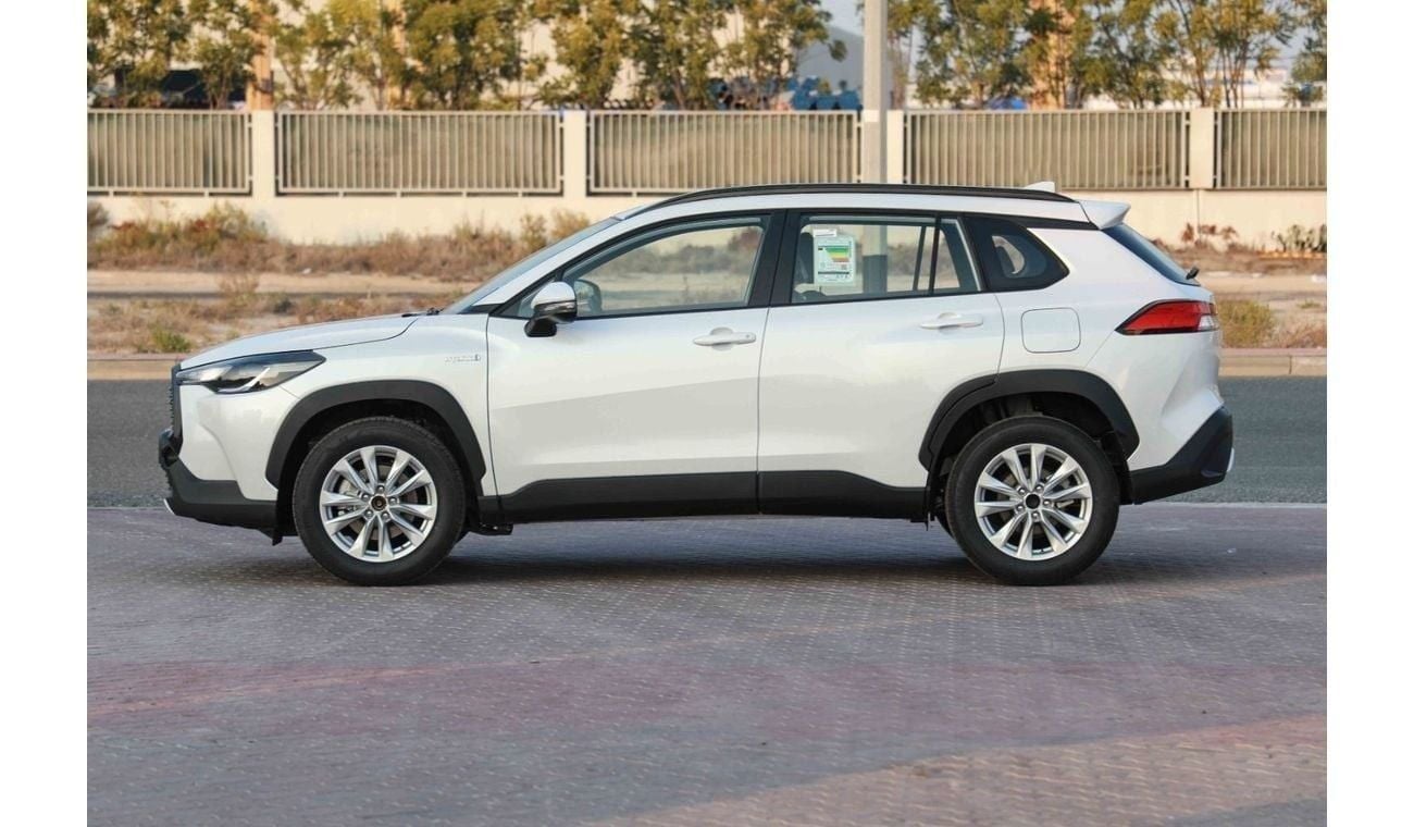 تويوتا كورولا كروس 2024 TOYOTA COROLLA CROSS 1.8 Hybrid MID - PLATINUM WHITE PEARL inside RED | Export Only