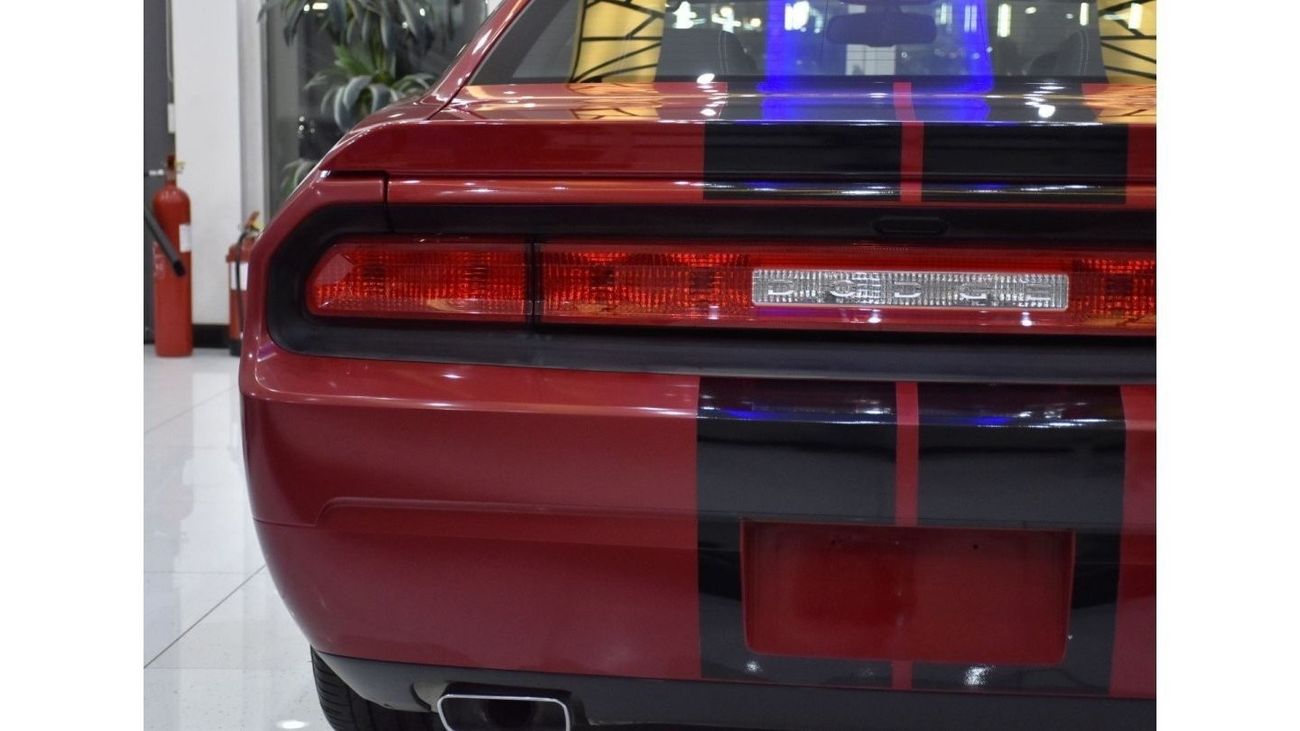 Dodge Challenger EXCELLENT DEAL for our Dodge Challenger SRT8 392 HEMI ( 2012 Model ) in Red Color GCC Specs