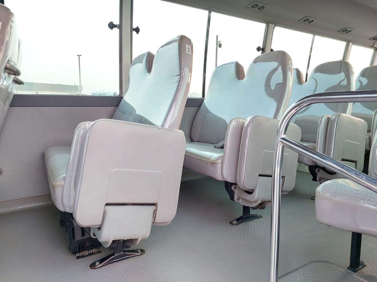 Toyota Coaster TOYOTA COASTER BUS RHD 2004 MODEL 4.0 L DIESEL AUTOMATIC(PM12501)