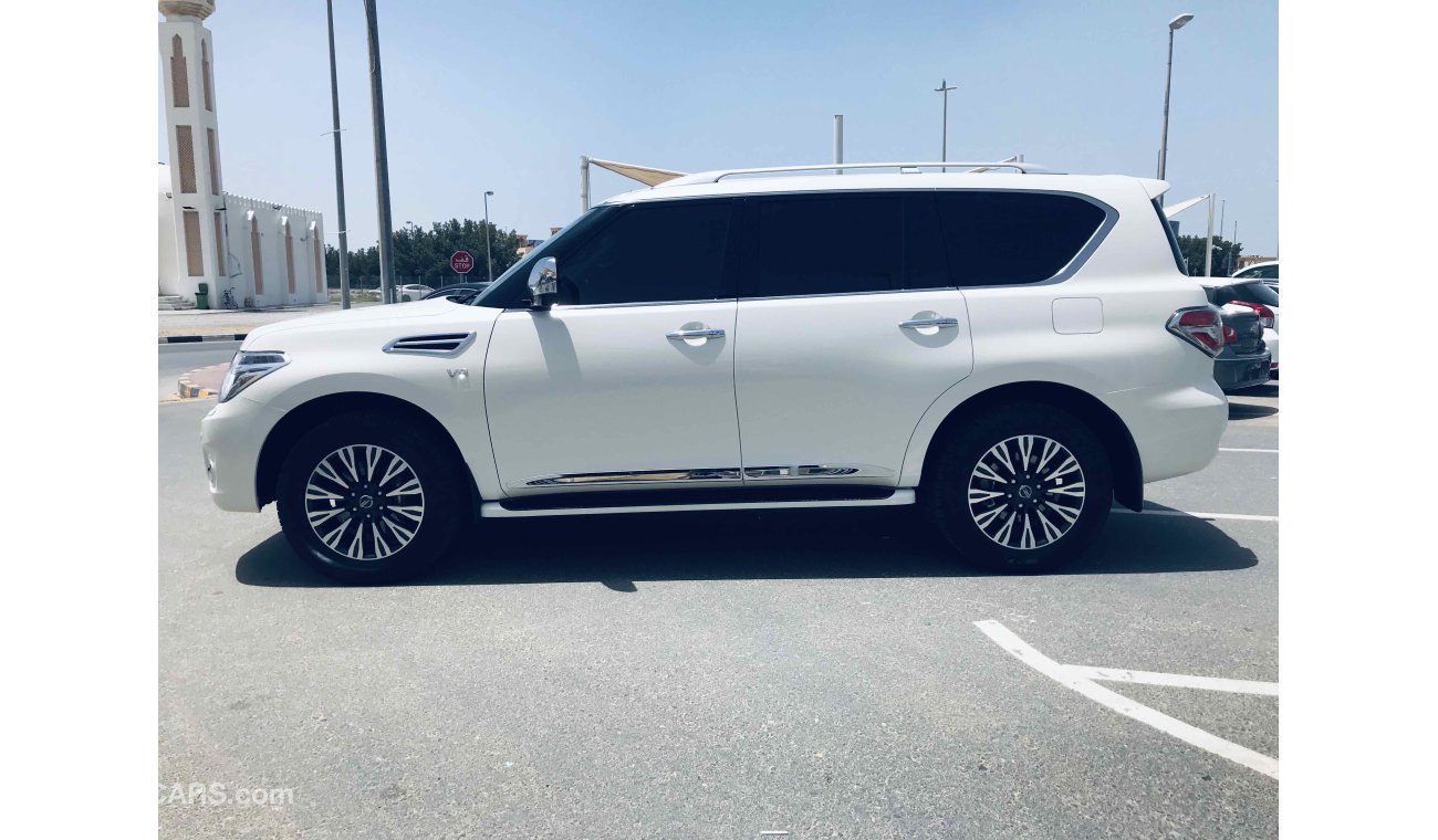 Nissan Patrol فل ابشن ماكينه كبيره صبغة وكاله تشيكات وكاله داخل الضمان بحاله ممتاذه