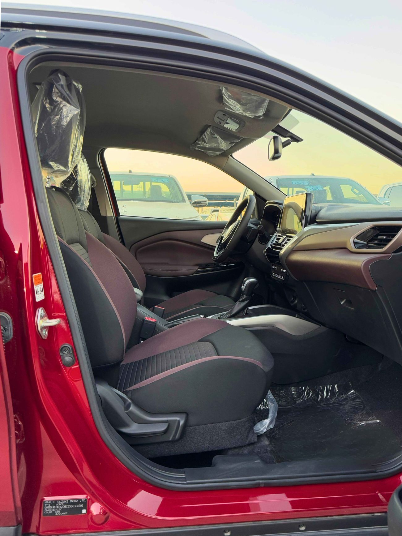 Suzuki Fronx DUAL TONE / 1.5L V4 HYBRID / DVD WITH 360* CAMERAS / AUTO A/C (CODE #  69011)