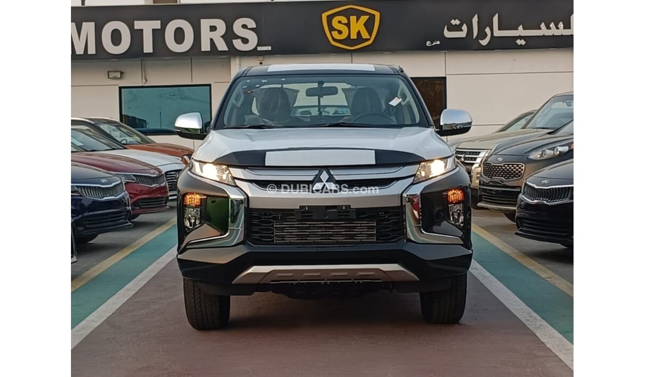 Mitsubishi L200 GLX 2.5L Diesel / M/T / 4WD / Black Rims / Steering Vol Control (Code # L2DDB)